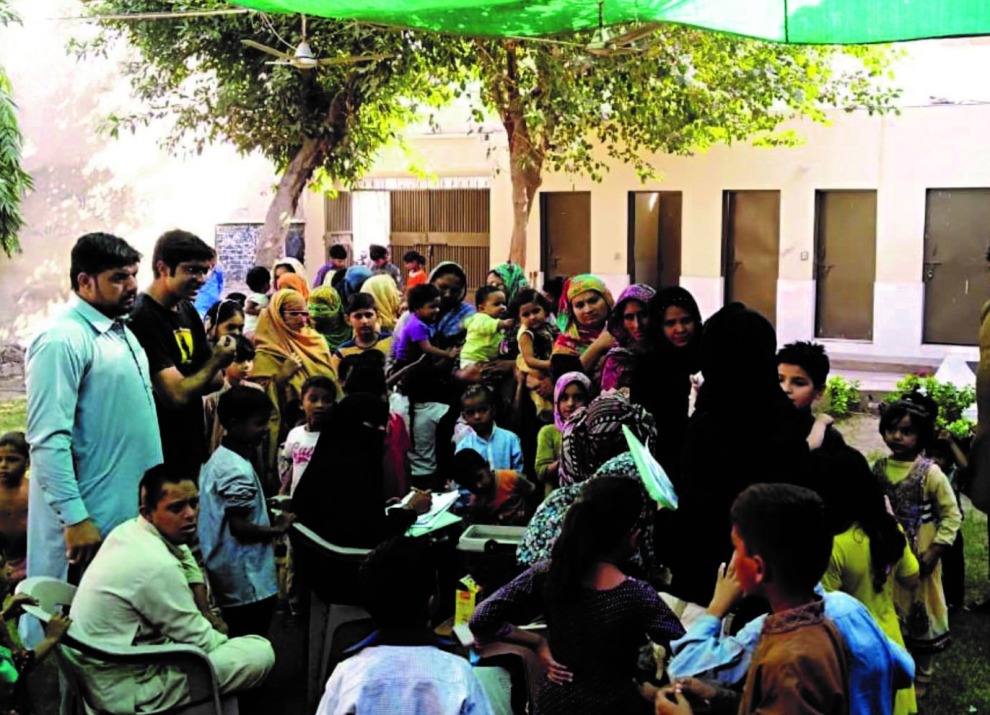 group-of-residents-in-Pakistan-gathered-outside