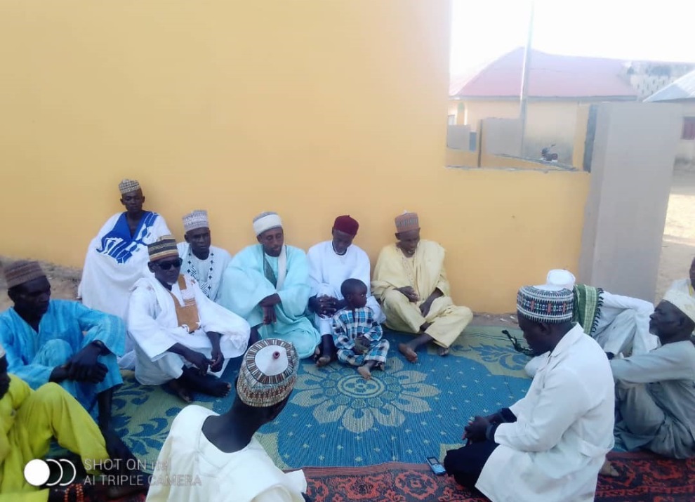 group-of-religious-leaders-sitting-in-circle
